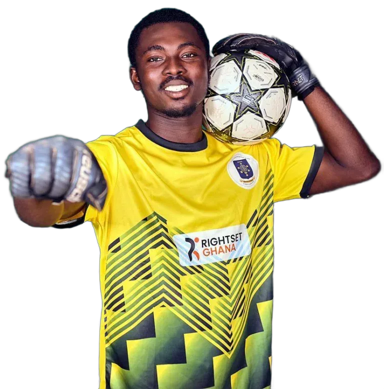 THEO in his goalkeeper kit with a football on his shoulder.